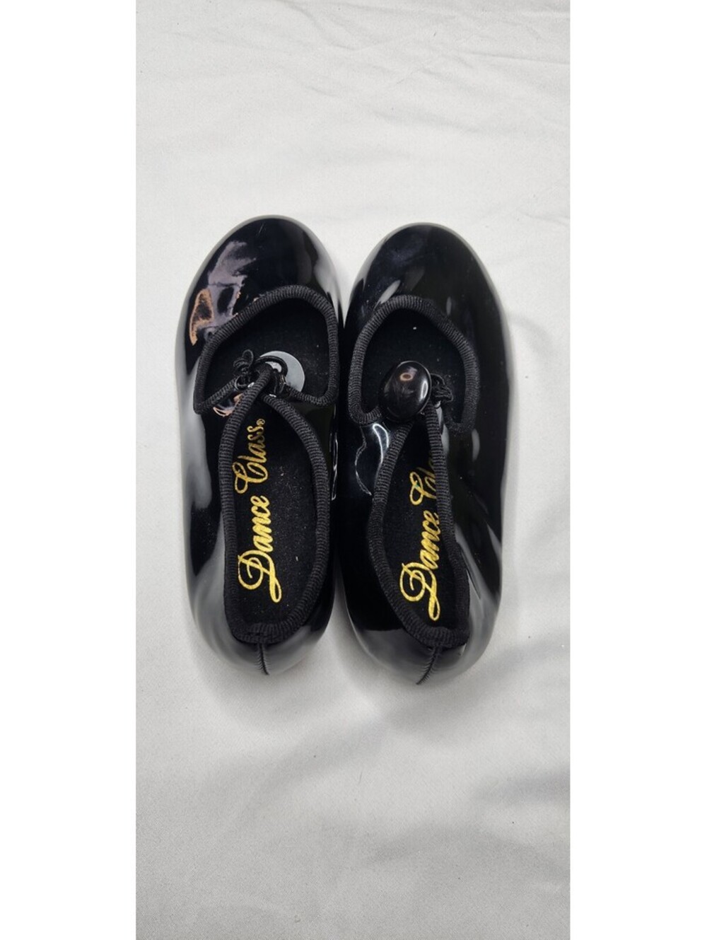Black patent tap shoes